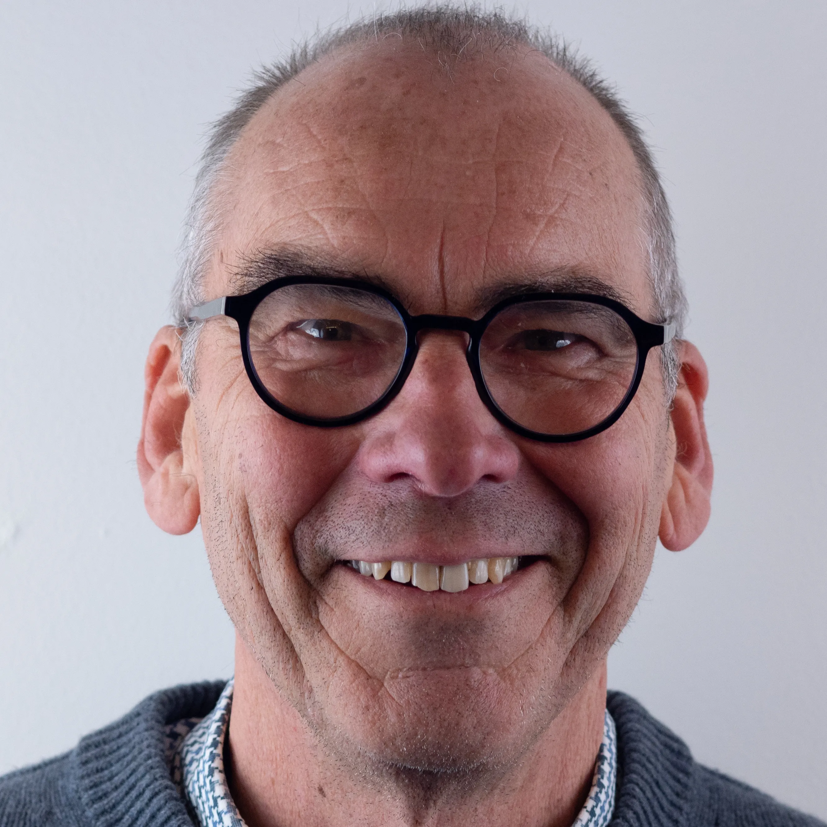 Een foto van Otto Berg, de dirigent van ons koor